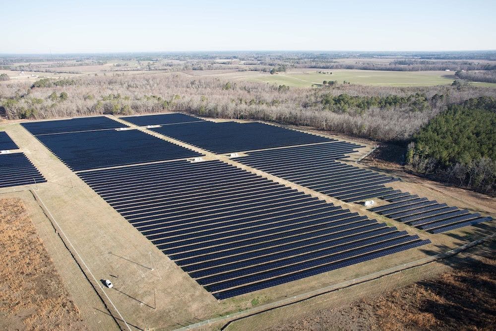 Solar panel array among farm fields