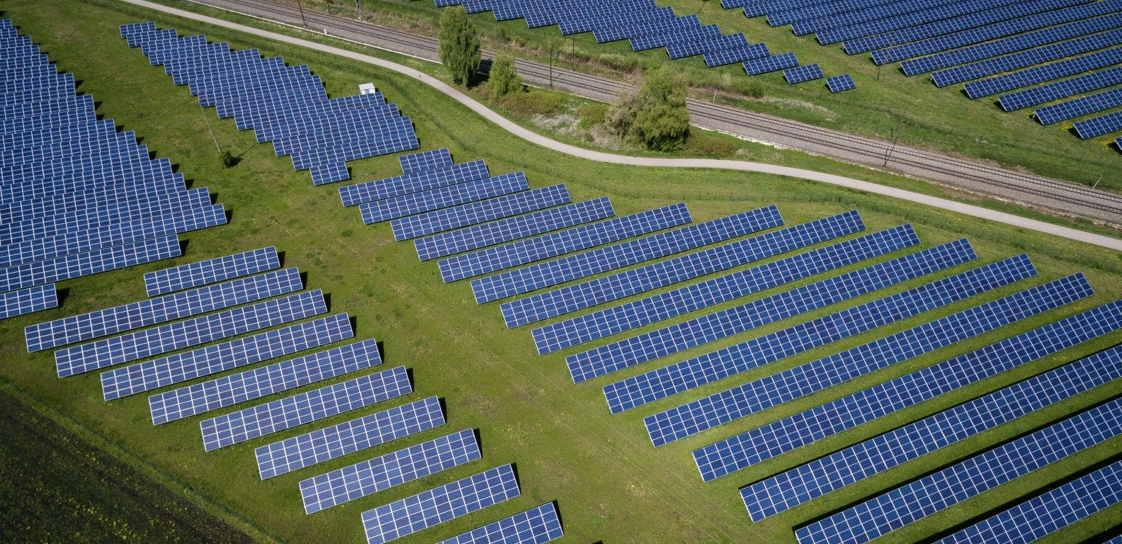 Overhead photo of solar panels in a field